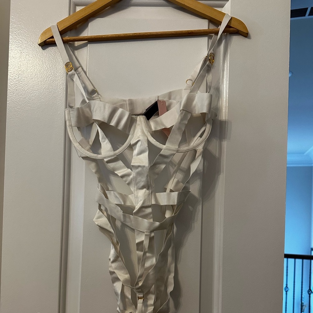 Sexy strappy teddy.  Never worn!  Tags on!
